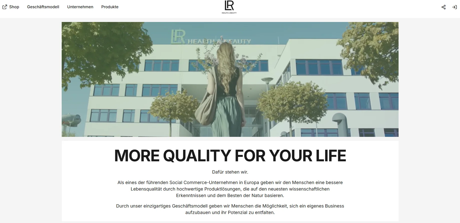 Person with long hair approaching the LR Health & Beauty company building, adorned with trees and clear signage.